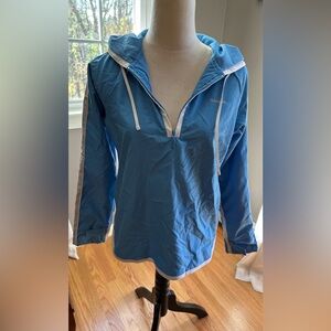 Reebok hooded pullover running jacket.